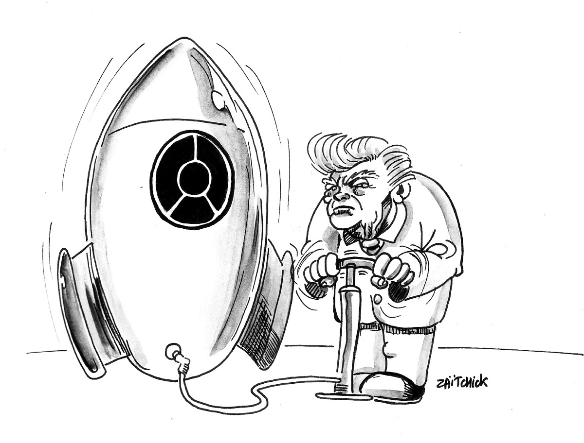 dessin d'actualité humoristique montrant Donald Trump en train de gonfler une bombe nucléaire